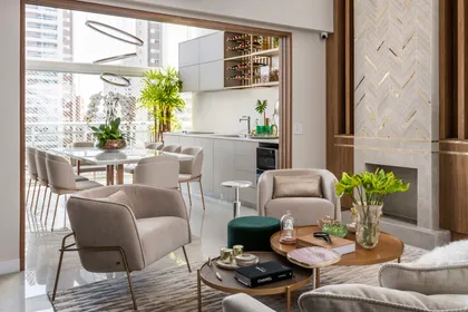 Living comedor moderno abierto con sofá curvo y mesa redonda — proyecto PANAMBY, por OKA ARQUITETURA, en São Paulo