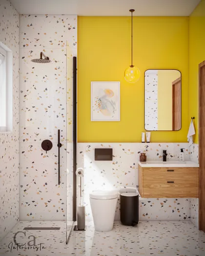 Baño moderno con paredes de terrazo y acento amarillo — proyecto Baño en 3D, por Carolina Interiorista, en Buenos Aires